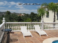 Guest terrace with view towards main villa