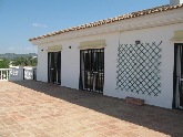 Front terrace with access to kitchen, lounge and master bedroom